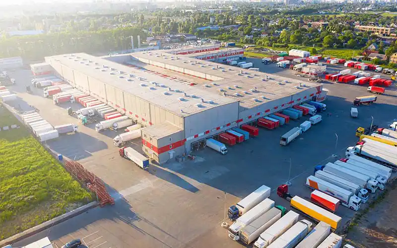 Arial view of logistics warehouse in summer