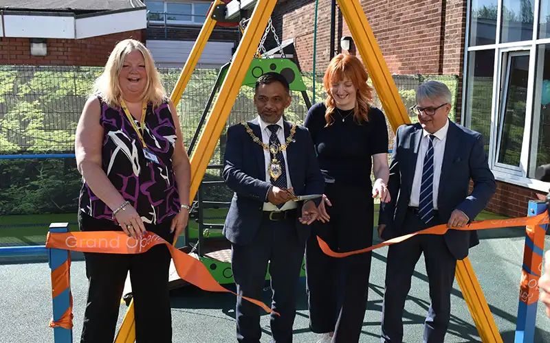 Certas team and Mayor cutting the ribbon.